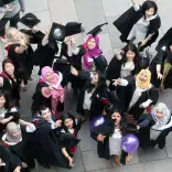 Students celebrating graduation